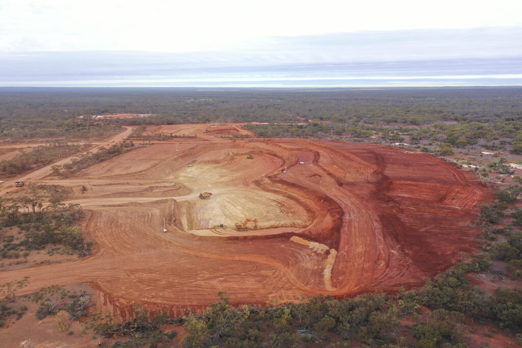 birds-eye-view-open-flat-mining-site-red-dirt