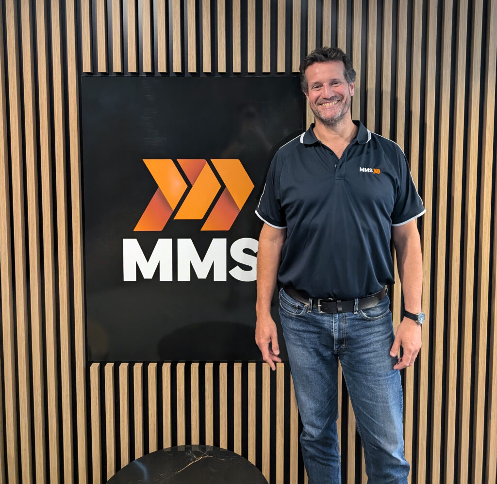 Rob-Seale-estimator-in-front-mineral-mining-services-logo