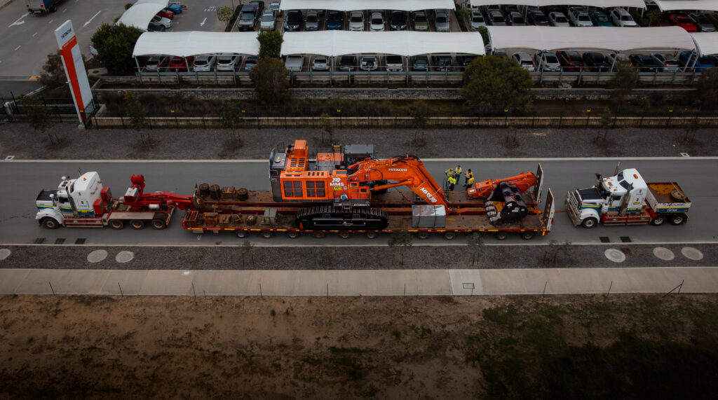 Drone view of an MMS excavator loading a haul truck at a mining site in Tennant Creek, Northern Territory.